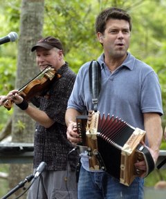 David Greely onstage with his longtime musical partner Steve Riley in Covington, La.  (Times-Picayune photo by Chuck Cook)