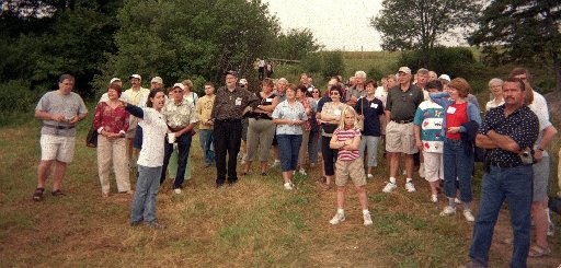 Sara Beanlands leads Thibodeau(x) family members on a tour of Willow Brook Farm. (Photo by Ron Thibodeaux)